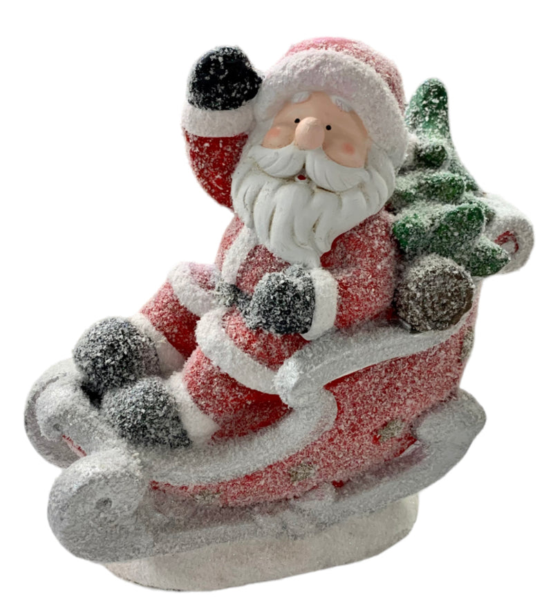 Santa in Snow Covered Sleigh